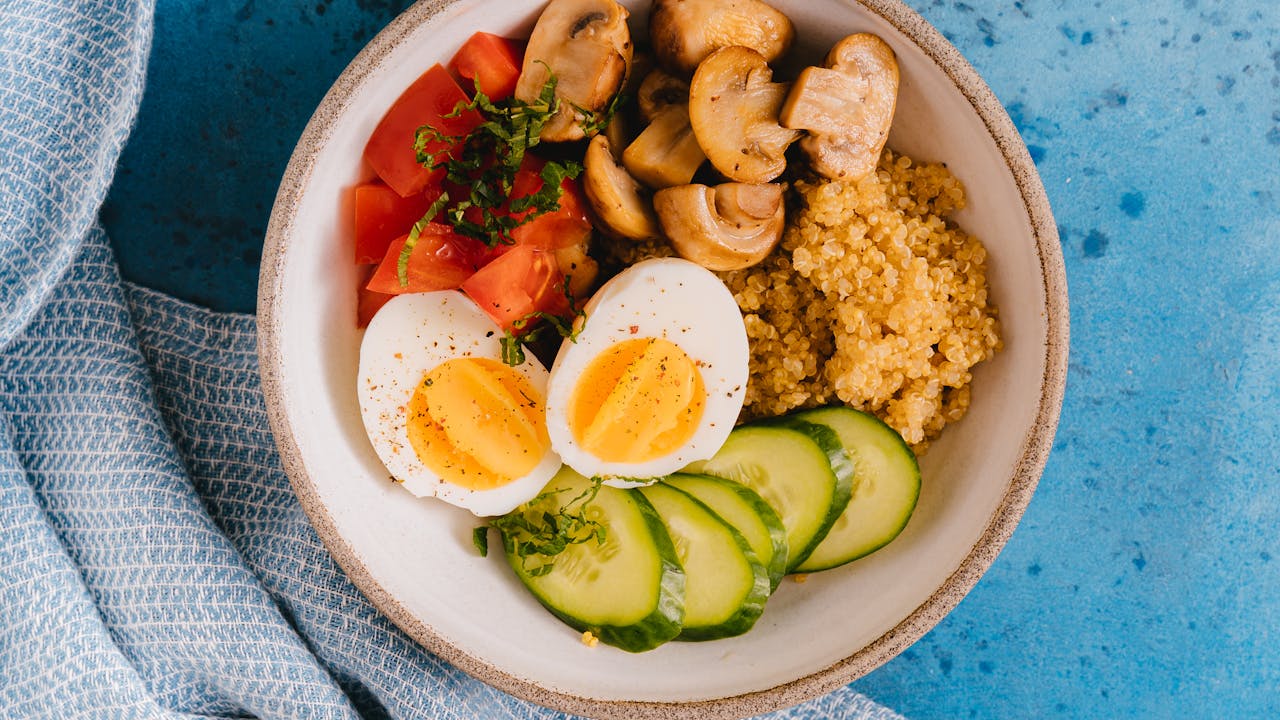 Person eating a healthy meal before an overnight fast