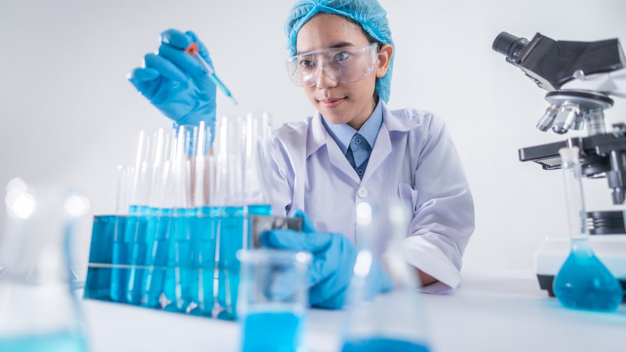 Science laboratory equipment and supplement capsules on a clean research bench, scientific analysis concept