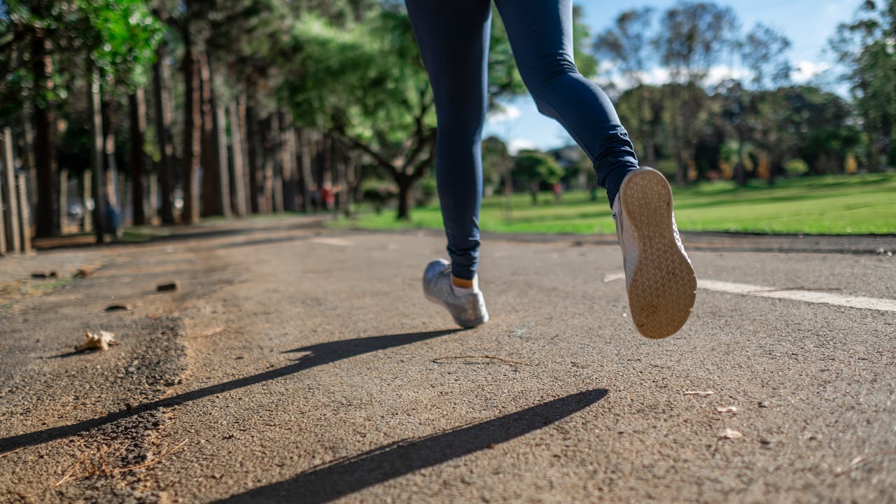 Person on morning wellness run representing active longevity lifestyle
