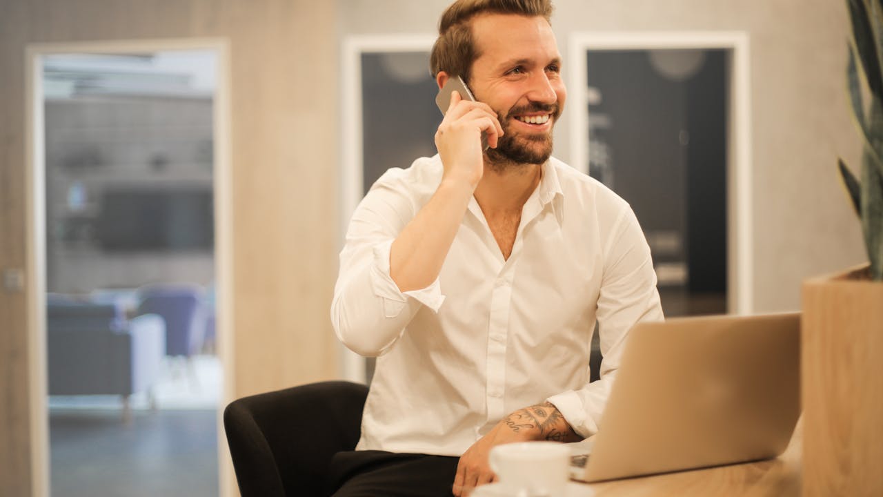 Person in focused productive work state at a clean desk