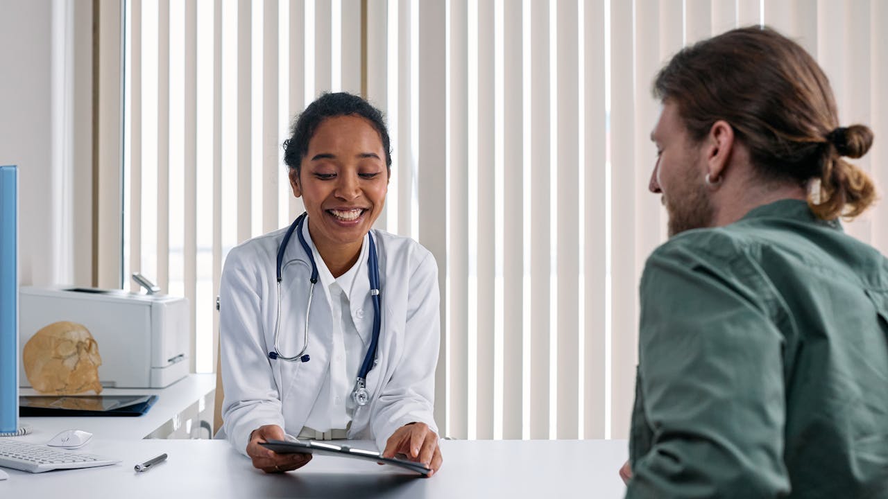 A doctor conducting a telemedicine consultation