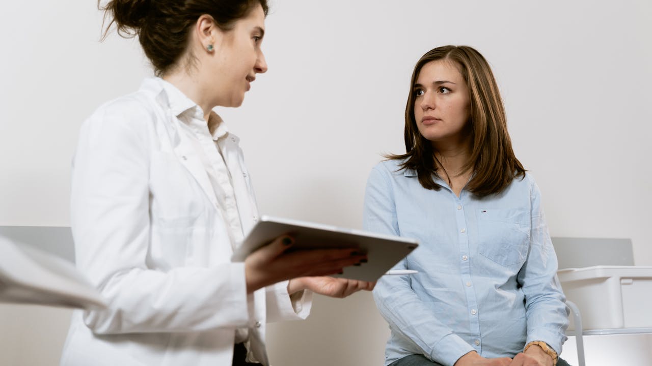 Person receiving IV therapy in a modern wellness clinic