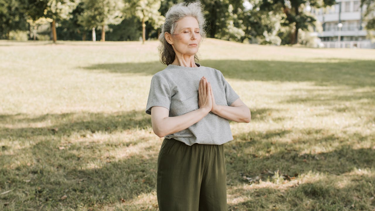 Healthy active older adult enjoying outdoors, representing longevity and vitality